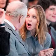 King Charles Attends Fashion Show Amid Brother Andrew's Arrest