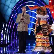 Masked Singer's Moth Cries as Fans Identify Keisha Buchanan
