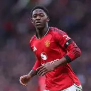 Michael Carrick Predicts Bright Future for Kobbie Mainoo at Manchester United