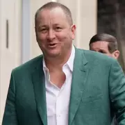 Mike Ashley Poised for Crucial Talks to Acquire Sheffield Wednesday Football Club