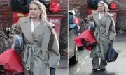 Molly-Mae Hague Spotted in Chic Trench Coat with Valentine's Flowers in Cheshire