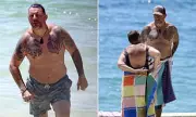My Kitchen Rules' Manu Feildel Reveals Hidden Tattoos on Sydney Beach Outing