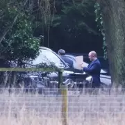 Police Seen Leaving Andrew's Sandringham Home with Mystery Folder After Birthday Arrest