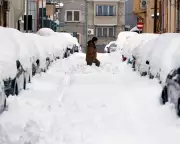 Romanian Capital Paralyzed by Heavy Snowfall as France Battles Relentless Storms