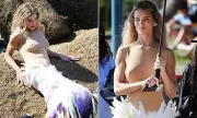 Rosie Huntington-Whiteley Stuns in Feathered Mugler Dress on Sydney Beach