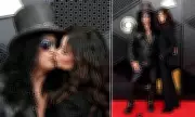 Slash and Meegan Hodges Share Red Carpet Kiss at 2026 Grammy Awards