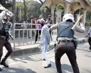 Snoop Dogg Curling and Global Protests: Friday's Photo Highlights