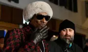 Snoop Dogg's Security Clashes with Speed Skating Legend at Winter Olympics