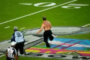 Super Bowl Streaker Halts Game with Cryptic Crypto Message on Bare Back