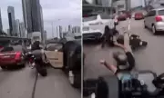 Toddler Opens Car Door on Malaysian Motorway, Causing Motorcycle Crash