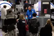TSA Agents Work Without Pay as Homeland Security Shutdown Hits Airports