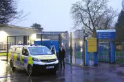 Two Boys Aged 12 and 13 Stabbed at London School, Teenage Suspect Hunted
