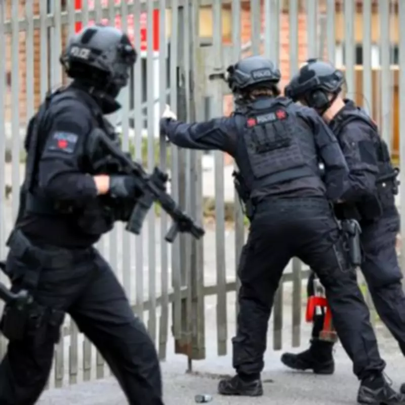Armed Police Storm Storage Unit in Oldham as Helicopter Circles Overhead