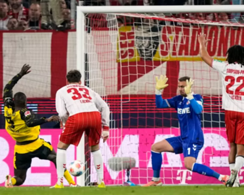 Borussia Dortmund Edge Closer to Champions League Spot with Cologne Victory