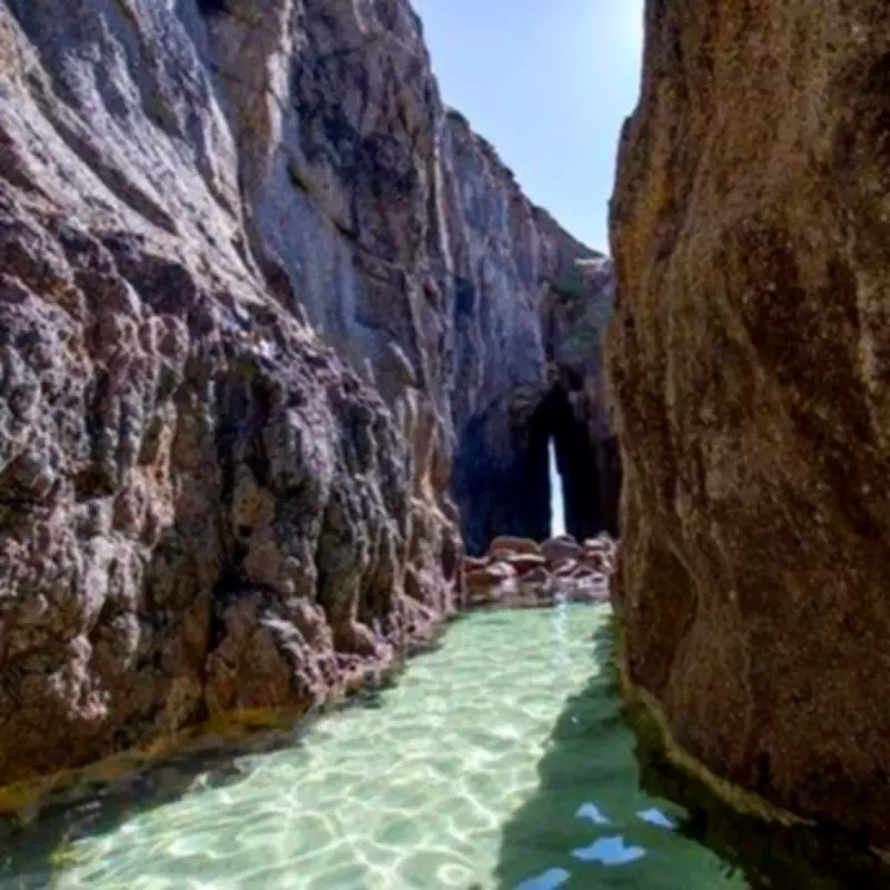 Cornwall's Hidden Gem: Nanjizal Beach's Crystal Waters and 'Song of the Sea' Cave