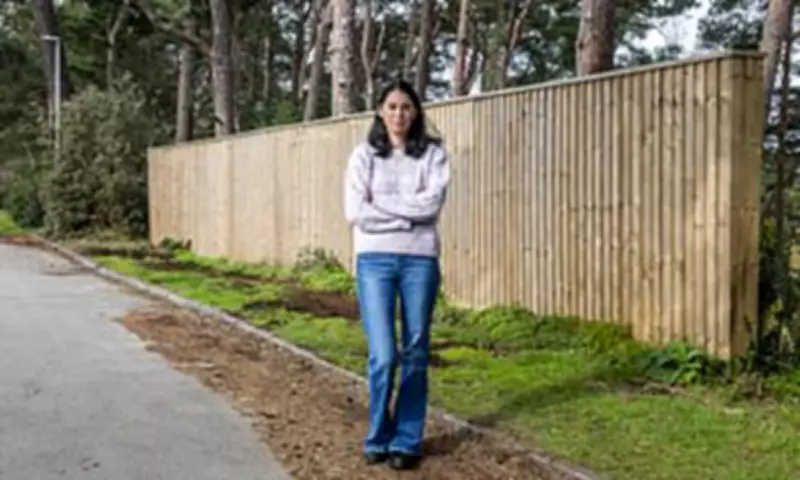 Couple Ordered to Demolish £3,000 Garden Fence Deemed 'Ugly' by Council