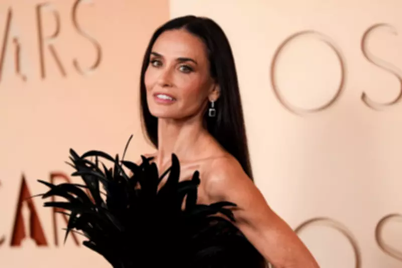 Demi Moore's Feathered Gucci Gown Sparks Oscars Fashion Frenzy