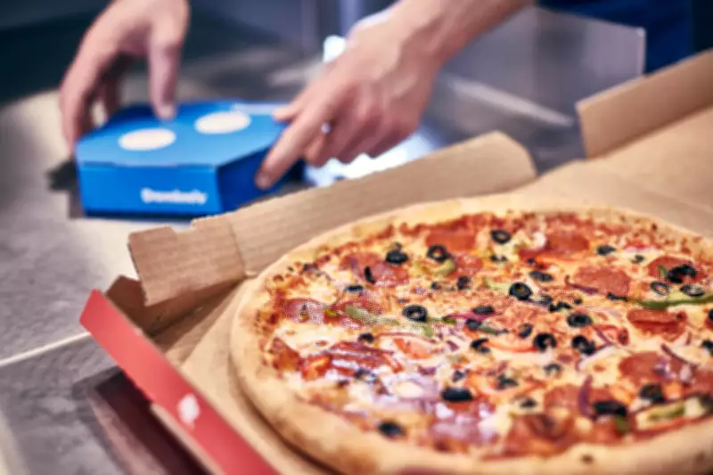 Domino's Pizza Sees Order Decline Amid Price Hikes and New Chicken Brand Focus