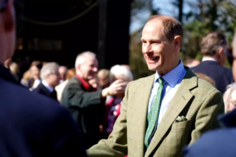 Duke of Edinburgh Prepares Gorilla Food During Bristol Zoo Project Visit