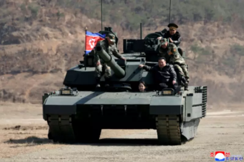 Kim Jong Un's Teen Daughter Drives Battle Tank in Military Drill Appearance