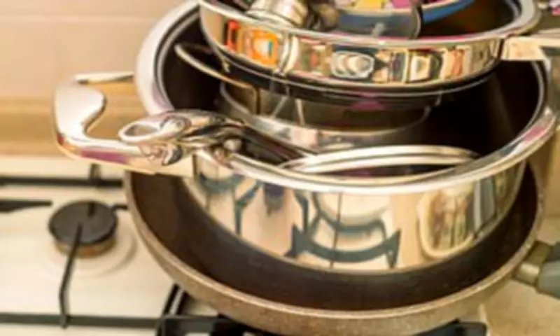 Kitchen Expert Warns: Stacking Pans Causes Hidden Damage and Wear