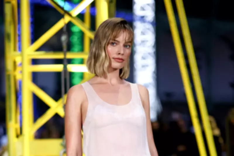 Margot Robbie Debuts Bold New Bob at Chanel's Paris Fashion Week Show