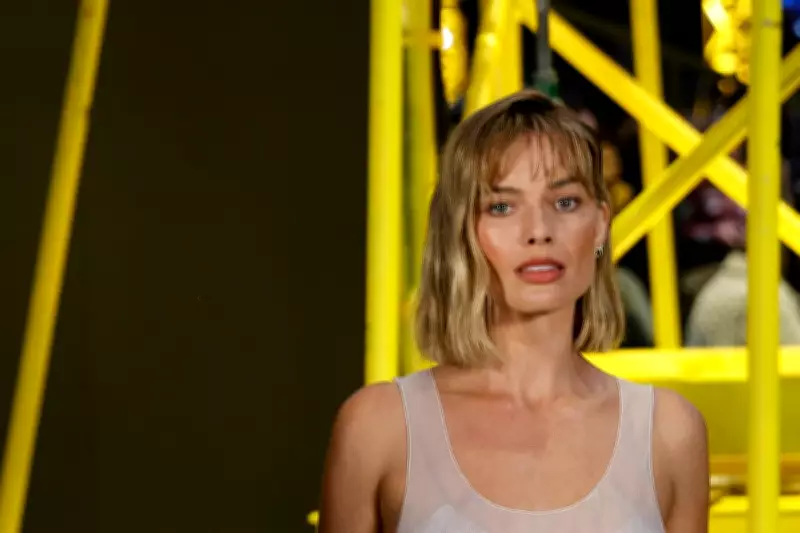 Margot Robbie Debuts Chic New Bob Haircut at Paris Fashion Week