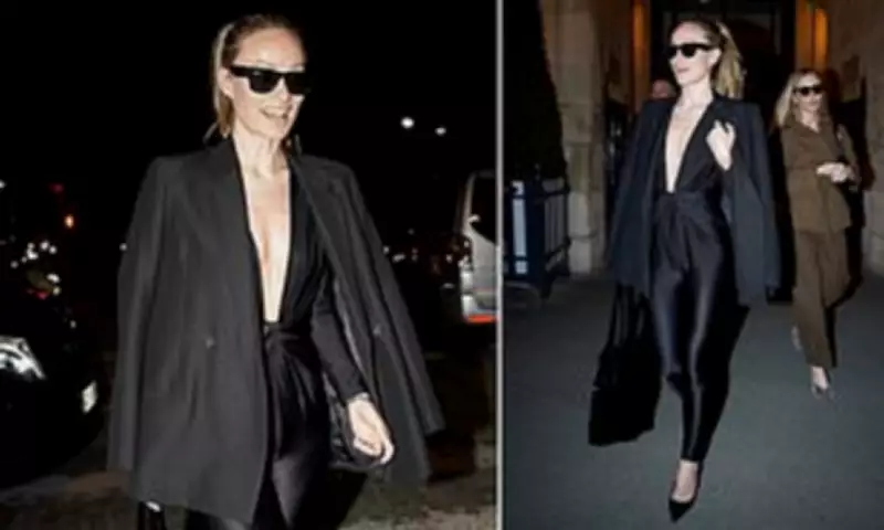 Olivia Wilde Stuns in Plunging Catsuit at Paris Fashion Week