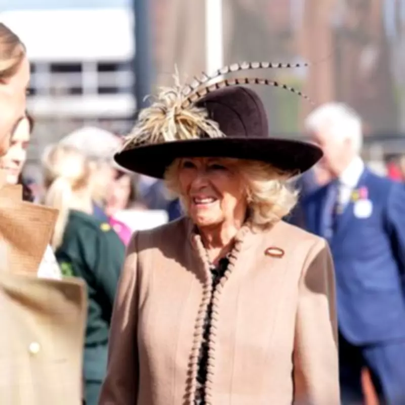 Queen Camilla's Flamboyant Hat Steals Show at Cheltenham Ladies Day