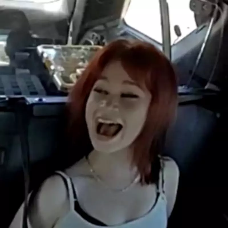 Schoolgirls Laugh in Police Car After Alleged Murder Plot to Drink Victim's Blood