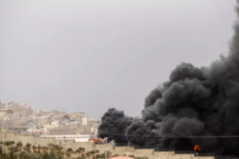 Tehran Engulfed in Smoke After US-Israeli Strikes Target Oil Depots