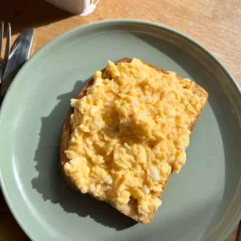 The Secret Topping That Transforms Scrambled Eggs Into Restaurant Quality