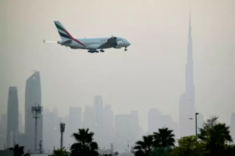 UAE Intercepts Iranian Missiles Over Dubai, Injuring Four Near Airport