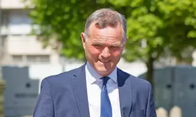 Grand National Trainer Accused of Hockey Stick Attack on Dog Walker