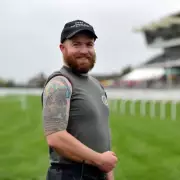 Cheltenham Festival Fence Attendant Ollie Smith Shares His Unique Role and Racing Passion