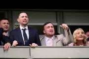 Darts Champion Luke Littler Celebrates at Cheltenham Festival with Girlfriend and Peers
