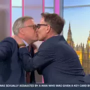 Ed Balls and Richard Arnold Kiss Live on GMB, Mimicking Harry Styles Oscars Moment