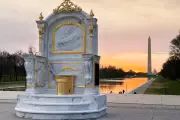Gold Toilet Sculpture 'Fit for a King' Installed on National Mall Criticising Trump