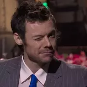 Harry Styles Kisses Male SNL Star, Silences Queerbaiting Claims with Comedy