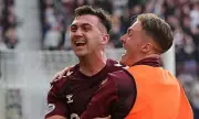 Hearts Survive Tense Tynecastle Clash to Maintain Title Charge