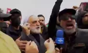 Iranian Official Defiantly Rages Against Israel During Rally as IDF Missile Explodes