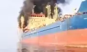 Iranian Strikes Ignite Tanker, Halt Strait of Hormuz Shipping, Threaten Oil Price Surge