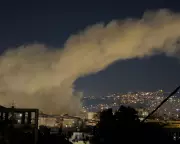 Israel Strikes Hezbollah in Beirut After Missile Barrage Over Border