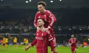 Liverpool's FA Cup Redemption: Robertson Shines in Victory Over Wolves