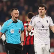 Manchester United Held by Bournemouth in Dramatic 2-2 Draw as Maguire Sees Red