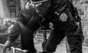 NYPD Chief's Barrier Jump Photo Goes Viral, Hailed as Heroic Pursuit