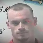 Parents Report Foul Smell Leading to Son's Arrest in Chilling Murder Case