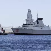 Putin's Propagandist Vows Missile Strikes on Royal Navy in Retaliation