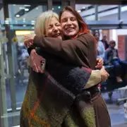 Relieved Brits Return Home on First Evacuation Flight from UAE After Iran Strikes