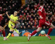 Richarlison's Late Strike Earns Spurs Vital Point at Anfield